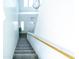 Bright staircase with contemporary railing providing access to the home's entry at 12161 W Flanagan St, Avondale, AZ 85323