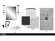 Bathroom featuring a frameless mirror, modern fixtures, and sleek black cabinetry at 13202 N 76Th Pl, Scottsdale, AZ 85260