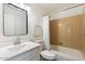 Bathroom with a vanity, framed mirror, tiled shower, and toilet at 14401 N Boxwood Ln, Fountain Hills, AZ 85268