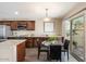 Elegant dining area with granite countertops and modern stainless steel appliances, ideal for entertaining at 14401 N Boxwood Ln, Fountain Hills, AZ 85268