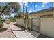 Exterior shot of home with desert landscaping and private courtyard at 14401 N Boxwood Ln, Fountain Hills, AZ 85268