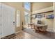 Inviting game room with tile floors, natural light, and entertainment features at 14430 W Windsor Ave, Goodyear, AZ 85395