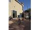 Tile patio with bikes, sliding door to home at 1448 E Mobile Ln, Phoenix, AZ 85040