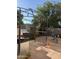 Backyard area featuring a grill, and outdoor dining set-up, perfect for entertaining and relaxation at 1448 E Mobile Ln, Phoenix, AZ 85040