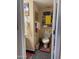 Cozy half bathroom with charming decor, featuring a toilet with custom lettering at 1448 E Mobile Ln, Phoenix, AZ 85040