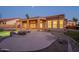 The back of the house, showing the covered porch, yard and pool at 1506 W Laurel Ave, Gilbert, AZ 85233