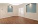 Bedroom includes wood-look flooring and decorative alcoves at 1506 W Laurel Ave, Gilbert, AZ 85233