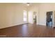Bright bedroom includes wood-look flooring and en-suite bath at 1506 W Laurel Ave, Gilbert, AZ 85233