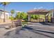Gated entry to Playa Del Rey, a lake community with lush landscaping, and secure access at 1506 W Laurel Ave, Gilbert, AZ 85233