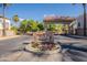 Welcome to Playa Del Rey, a recreational lake community entrance, featuring colorful landscaping and privacy gate at 1506 W Laurel Ave, Gilbert, AZ 85233