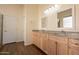 Main bath features double sinks, granite counters and separate tub and shower at 1506 W Laurel Ave, Gilbert, AZ 85233