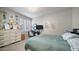 Bedroom with neutral color scheme, natural light, dresser, and a modern work space at 15252 N 100Th St # 1134, Scottsdale, AZ 85260