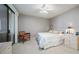 Calm bedroom with a ceiling fan, private access to the balcony and neutral walls at 15252 N 100Th St # 1134, Scottsdale, AZ 85260