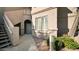 Inviting condo exterior with private entrance, covered stairs, and desert landscaping at 15252 N 100Th St # 1134, Scottsdale, AZ 85260