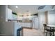 Bright kitchen with white cabinetry, modern appliances, and ample counter space at 15252 N 100Th St # 1134, Scottsdale, AZ 85260