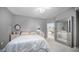 Comfortable main bedroom features a ceiling fan, ensuite bathroom, and beautiful decor at 15252 N 100Th St # 1134, Scottsdale, AZ 85260