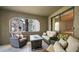 Comfortable outdoor seating with a table and view of the community at 15252 N 100Th St # 1134, Scottsdale, AZ 85260