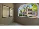 Patio with stucco wall and archway offering a view of the community at 15252 N 100Th St # 1134, Scottsdale, AZ 85260