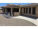 View of backyard patio with outdoor seating and built in grill at 15352 W Ventura St, Surprise, AZ 85379
