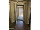 Foyer with decorative tile flooring and a secure screen door at 15352 W Ventura St, Surprise, AZ 85379