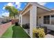 The covered back porch offers outdoor living space with synthetic grass and views of the hillside at 16636 S 22Nd St, Phoenix, AZ 85048