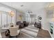 Open-concept dining room features a pendant light, plantation shutters, and access to living area at 16636 S 22Nd St, Phoenix, AZ 85048