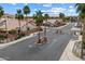 Welcome to this gated community entrance with desert landscaping, palm trees, and well-maintained entry at 16636 S 22Nd St, Phoenix, AZ 85048