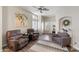 The open concept living room is filled with natural light, hardwood-style floors, and neutral paint at 16636 S 22Nd St, Phoenix, AZ 85048