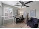 A well-lit office space with a desk, comfortable chair, and inspiring decor for productivity at 16636 S 22Nd St, Phoenix, AZ 85048