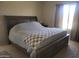 Bedroom with natural light and a comfortable bed at 1769 E Jacob St, San Tan Valley, AZ 85140