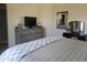 Bedroom with a TV set on a large gray dresser at 1769 E Jacob St, San Tan Valley, AZ 85140