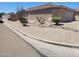 Inviting single-story home with low-maintenance desert landscaping for easy care at 1769 E Jacob St, San Tan Valley, AZ 85140