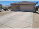 Well maintained single-story home featuring desert landscaping and a spacious driveway at 1769 E Jacob St, San Tan Valley, AZ 85140