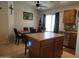 Eat-in kitchen with dining table and chairs, and granite counters at 1769 E Jacob St, San Tan Valley, AZ 85140