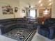 Cozy living room with comfortable seating and stylish southwestern rug at 1769 E Jacob St, San Tan Valley, AZ 85140