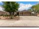 Charming single-Gathering home with a well-maintained front yard and attached garage at 18359 W Sweet Acacia Dr, Goodyear, AZ 85338