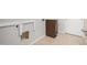 A laundry room with hookups and tiled floor at 18359 W Sweet Acacia Dr, Goodyear, AZ 85338