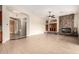 Bright living room featuring fireplace, recessed lighting and views of the entryway at 18359 W Sweet Acacia Dr, Goodyear, AZ 85338