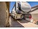 Large RV parked in driveway, showing additional parking space for recreational vehicles or extra vehicles at 18662 W Foothill Dr, Surprise, AZ 85387