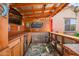 Entertaining outdoor bar area with wood accents, a tropical rug, and plenty of seating at 18662 W Foothill Dr, Surprise, AZ 85387