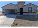 Charming single-story home featuring low maintenance desert landscaping and a convenient two-car garage at 18795 E Bruno Dr, Gold Canyon, AZ 85118