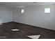 Bright and airy living room featuring tile floors, recessed lighting, and ample natural light at 18795 E Bruno Dr, Gold Canyon, AZ 85118