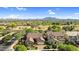 Desirable community featuring lush landscaping, tile roof homes, and mountain views at 19291 E Thornton Rd, Queen Creek, AZ 85142