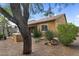 The property has an outdoor kitchen and is surrounded by desert landscaping at 19291 E Thornton Rd, Queen Creek, AZ 85142
