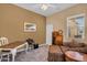 Home office with a desk, seating, and neutral paint at 19291 E Thornton Rd, Queen Creek, AZ 85142