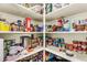 Organized walk-in pantry featuring shelving with lots of storage space for food and kitchen essentials at 19291 E Thornton Rd, Queen Creek, AZ 85142