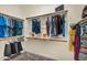 Walk-in closet with clothing racks and shelves at 19291 E Thornton Rd, Queen Creek, AZ 85142