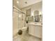 Bathroom featuring glass shower door, toilet, and vanity at 2042 W Periwinkle Way, Chandler, AZ 85248