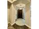 Welcoming foyer with decorative tile flooring and elegant lighting fixture, leading to other rooms at 2042 W Periwinkle Way, Chandler, AZ 85248