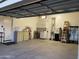 Spacious garage featuring laundry and water system at 2042 W Periwinkle Way, Chandler, AZ 85248